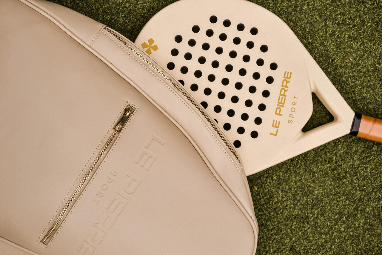 Le Pierre Sport padel bag and racket detail on court grass