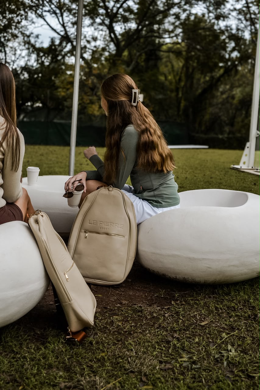 Le Pierre Sport bag beside padel seating